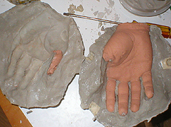 Build up this half of the mold with a 2nd or 3rd batch of plaster if needed, smooth out an allow to cure.