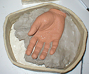 I then placed the hand on the Moulage.