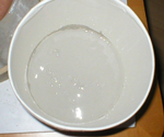 Mix up a small batch of Ultra-Cal 30 plaster for your first half of the mold. Mix up a small batch of Ultra-Cal 30 plaster for your first half of the mold.